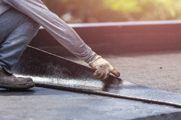 Professional Basement Waterproofing technician working in Ovid, MI